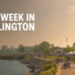 Burlington waterfront event with tents, visitors, and lakeside walkway